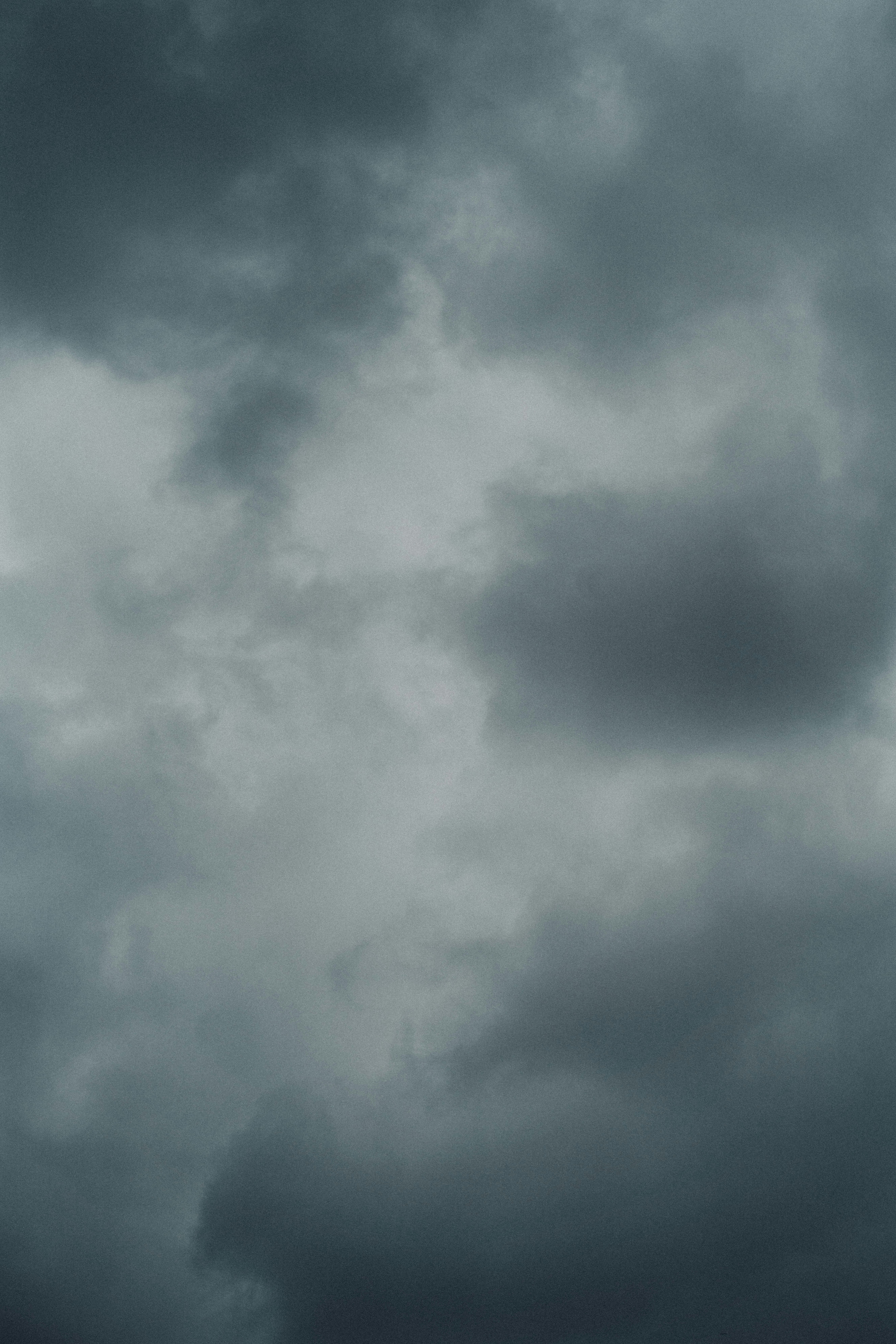 Dark storm clouds gathering in the sky, signaling heavy rain